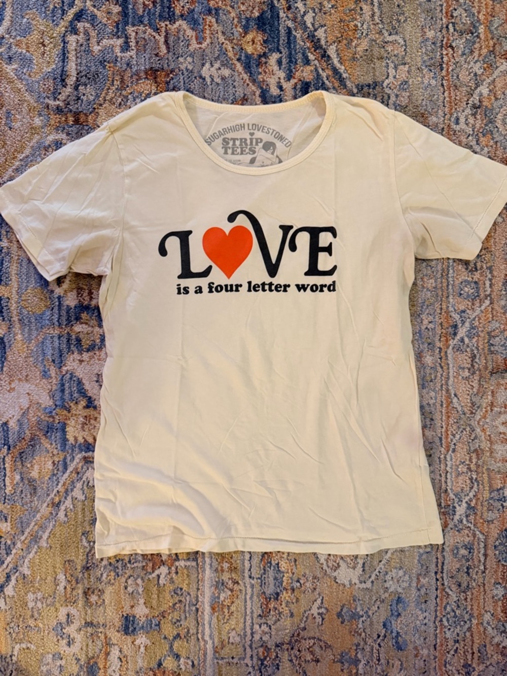 “LOVE is a Four Letter Word” Graphic Tee in Cream